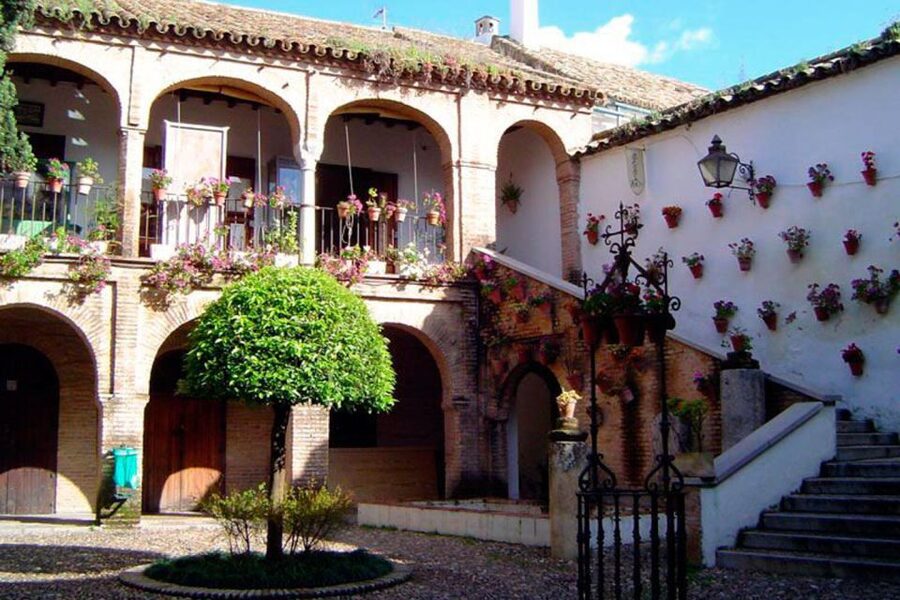 Cordoba Highlights Full-Day Tour from Granada - Alcázar of Córdoba: fortress walls and layered architecture