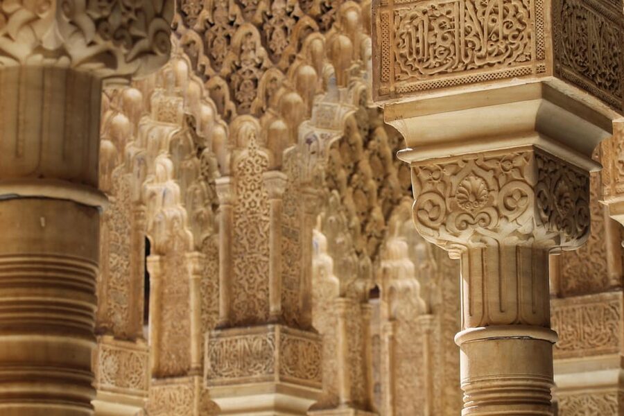 From Málaga: Sunset Alhambra Tour with Tickets - Charles V’s palace: symmetry in the middle of a Nasrid world