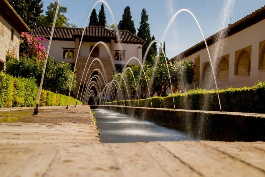 From Málaga: Sunset Alhambra Tour with Tickets - The Málaga to Granada van ride sets the tone for the day