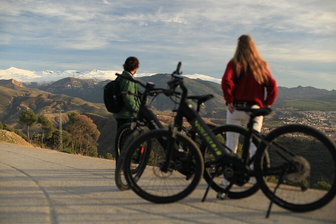 Granada: Alhambra and Sierra Nevada Sunset Views by E-Bike - Stop 1: The Alhambra Perimeter, Forest Riding, and a Quieter Palace Angle