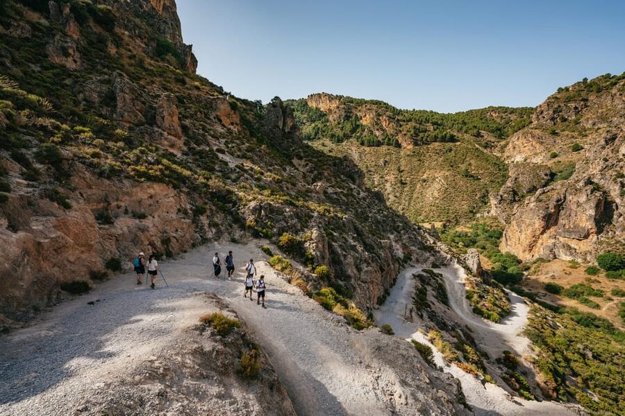 Granada: Los Cahorros de Monachil Canyon Hiking Tour - Into the canyon: tunnel-like passage and the meaning of Los Cahorros