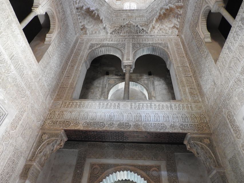 Granada: Sunset Legends of the Alhambra Guided Tour - Puerta del Vino and Cuesta del Rey Chico: Gates, Slopes, and a Changing Atmosphere