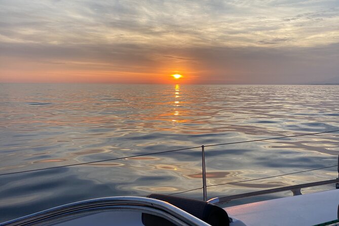Sailing at sunset along the cliffs of Maro-Compartida - Two Hours on Water, Where the Timing Changes by Season