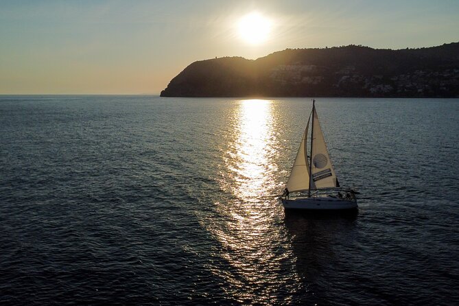 Sunset sailing along the cliffs of Maro- Private - Your Bavaria 37 and the Small-Group Feel (Up to 9)